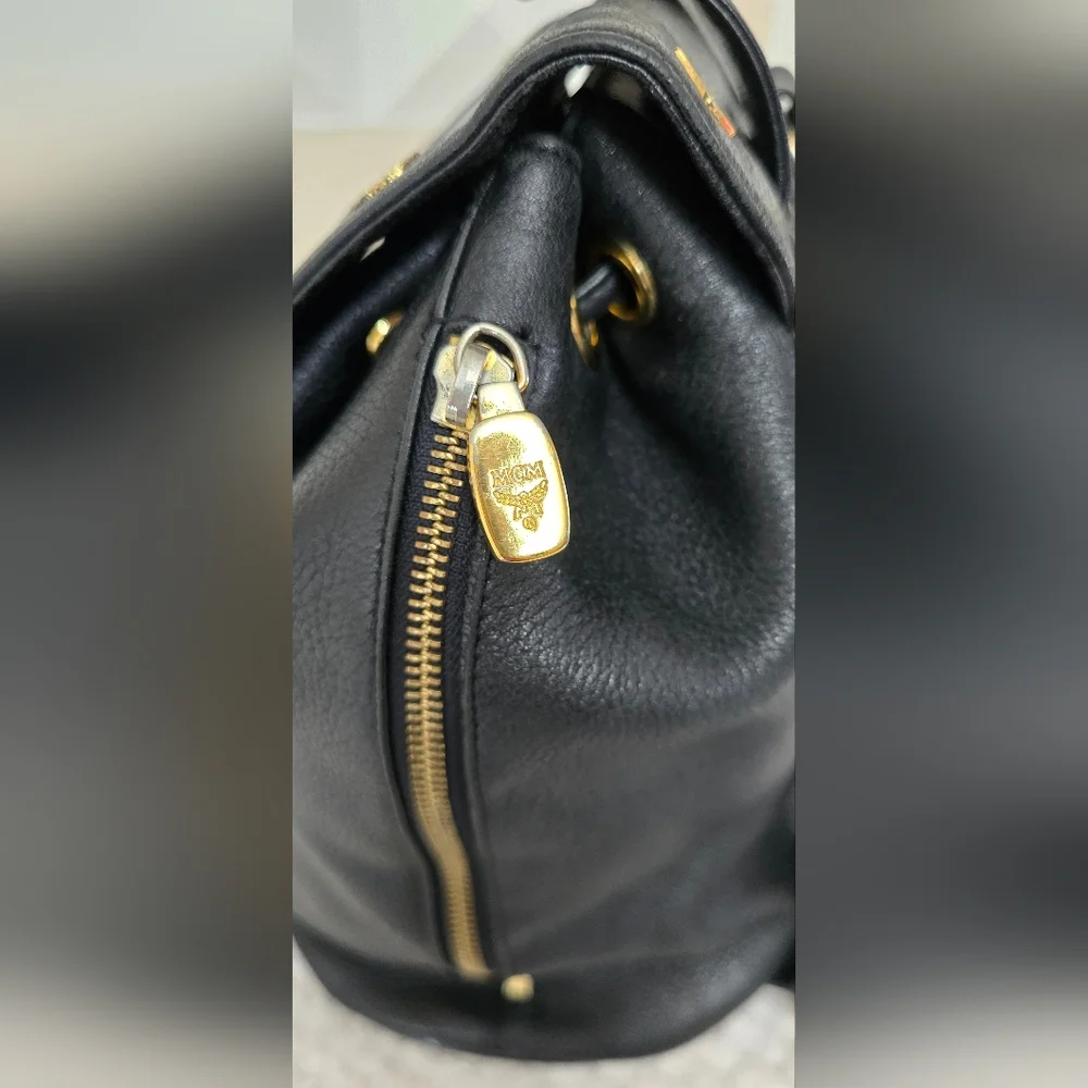 MCM Black Leather Studded Backpack Gold Hardware Drawstring Side Zip